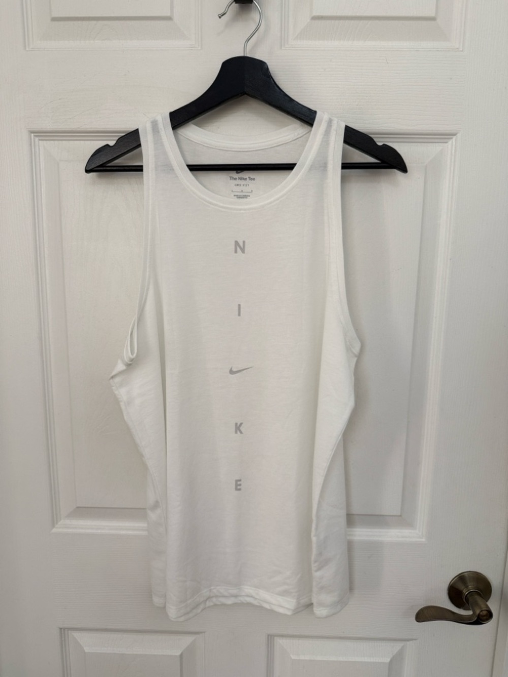 Nike women’s White Vertical Logo Racerback Tank